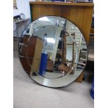 A LARGE CIRCULAR MIRROR, 100 CM IN DIAMETER