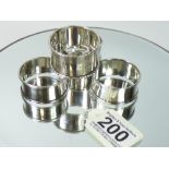 FOUR SILVER NAPKIN RINGS, VARIOUS MAKERS / DESIGN. LIGHT IN WEIGHT 4g