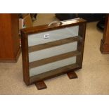 SMALL GLAZED PORTABLE CABINET