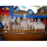 CUT GLASS DECANTER, 8 CHAMPAGNE FLUTES AND OTHER TABLE GLASSWARE