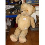 A VINTAGE TEDDY BEAR - 72 CM TALL - WITH ARTICULATED JOINTS AND A GROWL SOUND