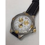 ZENITH DEFY QUARTZ 59 2000 393 STEEL AND GOLD QUARTZ WATCH TICKING AND TELLING TIME ONE WAY BEZEL