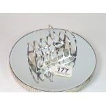 A SILVER TOAST RACK, SHEFFIELD 1922/23, MADE BY JAMES DEAKIN & SONS, WEIGHT 121g