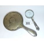 SILVER HAND MIRROR AND A SILVER HANDLED MAGNIFYING GLASS