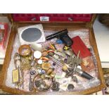 A MIXED BOX OF ITEMS INCLUDING BUTTONS, BANGLES, NUTCRACKERS, BOTTLE STOPPERS, THIMBLES, RINGS AND