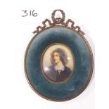 MINIATURE PAINTING OF A LADY IN AN ORNATE VELVET FRAME