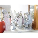 A COLLECTION OF 9 CERAMIC FIGURES, INCLUDING LLADRO