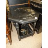 A VICTORIAN EBONISED 2-TIER OCTAGONAL TABLE