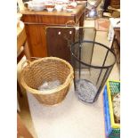 A BRASS RIMMED FIREGUARD, METAL LOG BASKET AND ANOTHER BASKET