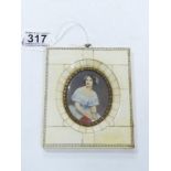 A FRAMED PORTRAIT MINIATURE OF A LADY