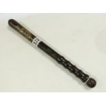 A WOODEN POLICE TRUNCHEON WITH ORNATE DECORATION IN PLACES, DATED 1916-19, APPROX 40 CM IN LENGTH