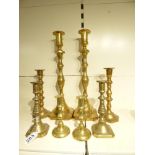 A COLLECTION OF 4 PAIRS OF BRASS CANDLESTICKS, LARGEST PAIR IS 43.5 CM TALL