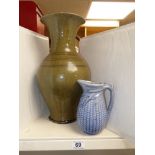 A HEAVY, GREEN GLAZED, POTTERY VASE (APPROX 40CM) AND A CORN COB STYLE JUG