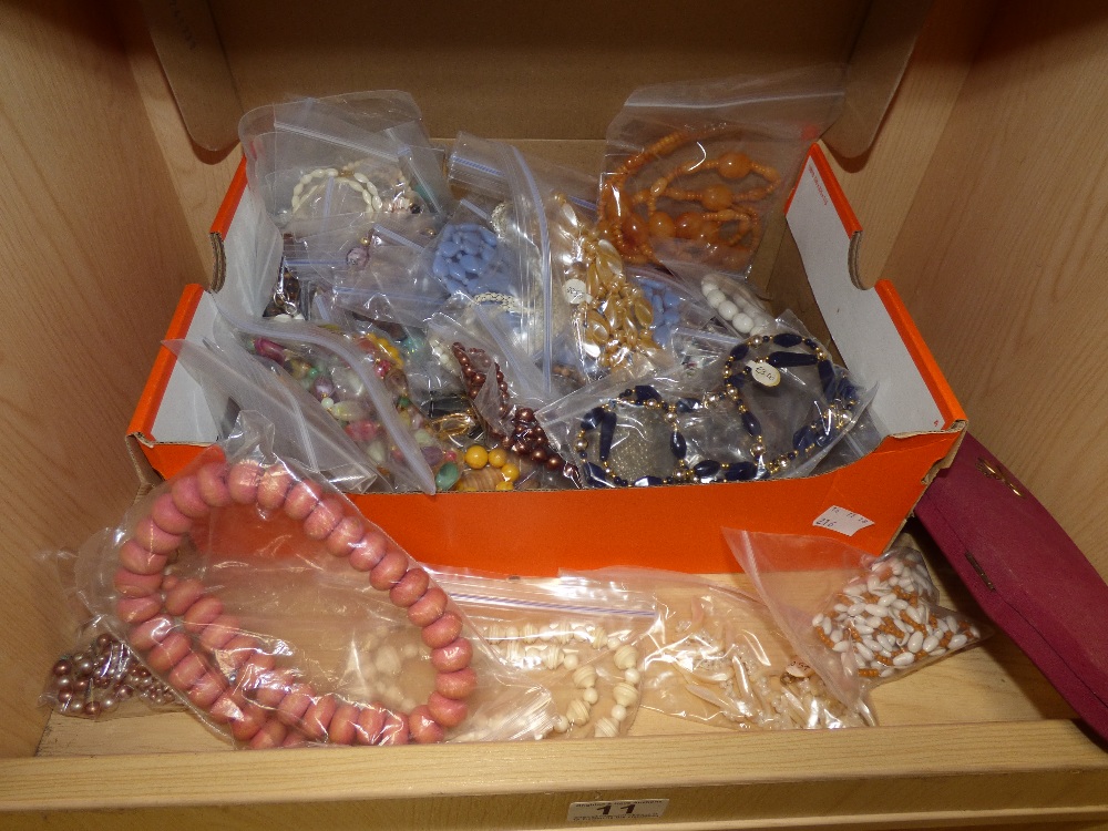 A QUANTITY OF COSTUME JEWELLERY