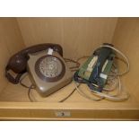 A 1970s TRIM PUSH BUTTON PHONE AND A 1980s DIAL TELEPHONE