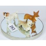 TWO BESWICK CERAMIC DOGS, INCLUDING A CORGI AND THE OTHER MARKED "MIRANDA C. SMITH"