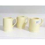 THREE 1930s NEAR-MATCHING KEITH MURRAY FOR WEDGWOOD TANKARDS (12 CM TALL)