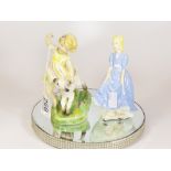 A ROYAL WORCESTER PORCELAIN FIGURE OF A GIRL WITH LAMB "APRIL 3416" AND ANOTHER FIGURE "COQUETTE"