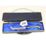 A SILVER PISTOL GRIP HANDLED CHEESE KNIFE, JOHN CHATTERLEY AND SONS OF SHEFFIELD, BOXED