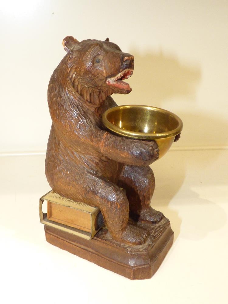 A BLACK FOREST MATCHBOX HOLDER IN THE FORM OF A SEATED BEAR, TOGETHER WITH AN EVOLUTIONARY - Image 3 of 4