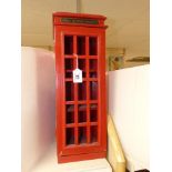 A PAINTED MODEL OF A LONDON TELEPHONE BOX
