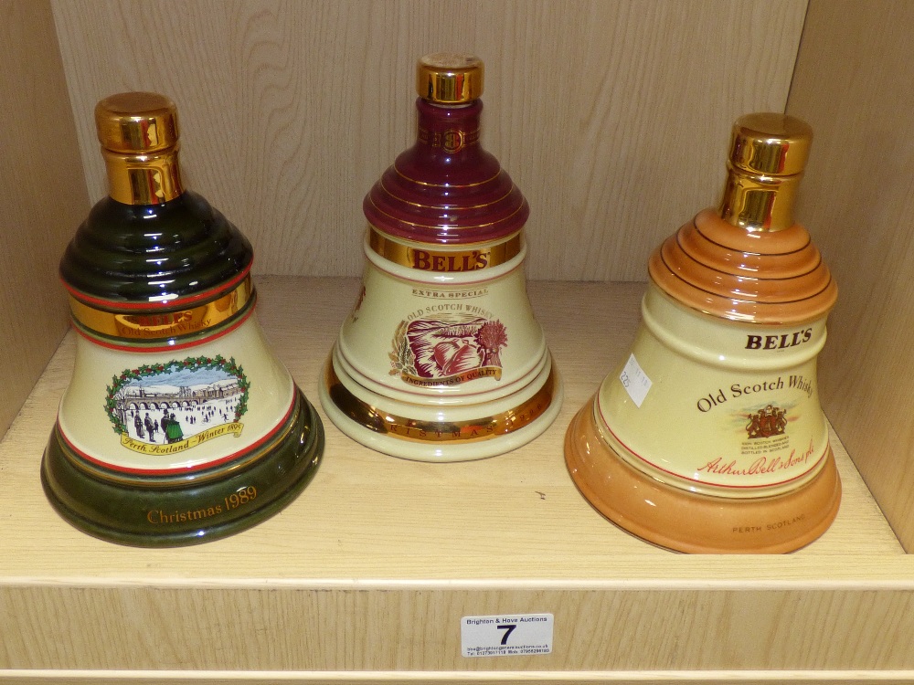 THREE EMPTY WADE BELLS WHISKY DECANTERS FROM CHRISTMAS 1989, 1996 AND AN UNDATED EXAMPLE