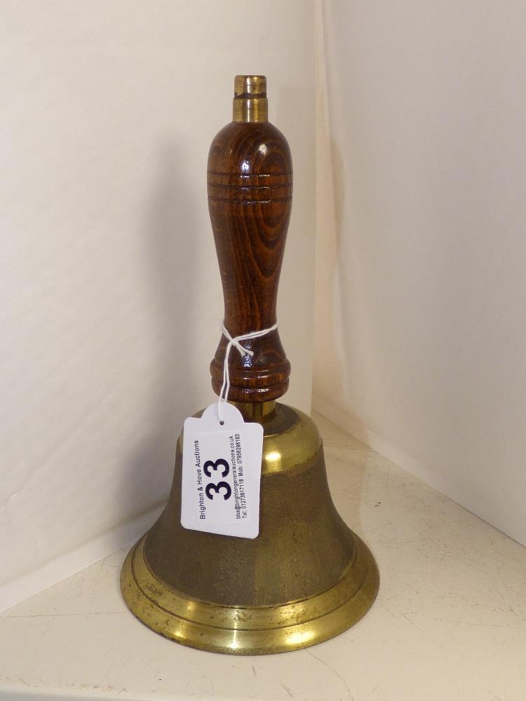 A BRASS HAND BELL