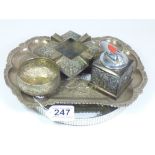AN ORIENTAL SILVER ASHTRAY AND TABLE LIGHTER, WITH A WHITE METAL TRAY AND DISH