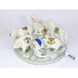 SIX PIECES OF CRESTED CHINA, ALL MODELLED AS ANIMALS INCLUDING 2 PIGS, A BULLDOG, LION AND MORE