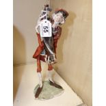 CERAMIC FIGURE OF MAN WITH GOLF CLUB SIGNED MARTINI TO BASE 29.5CM
