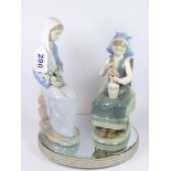 2 LLADRO FIGURES OF GIRLS HOLDING FLOWERS