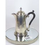 A GEORGE I STYLE SILVER POURING JUG WITH A WOODEN HANDLE, HALLMARKED SHEFFIELD 1903 BY MAPLE & Co,