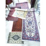 A GROUP OF ASSORTED RUGS