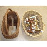 2 WICKER BASKETS WITH A COLLECTION OF CRUCIFIXES