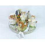 SIX CERAMIC FIGURES, COMPRISING 2 FROM THE ROYAL DOULTON WINNIE THE POOH COLLECTION; 2 BY BESWICK