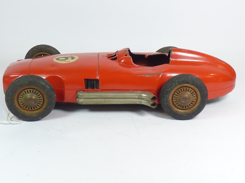 RED TINPLATE RACING CAR, MADE IN WEST GERMANY, MISSING SEAT & INTERIOR, WITH DRIVER STEERING - Image 9 of 12