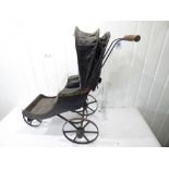 1870 DOLLS PUSH CHAIR, WOODEN WITH METAL FRAME ELEMENTS AND RETRACTABLE CANOPY