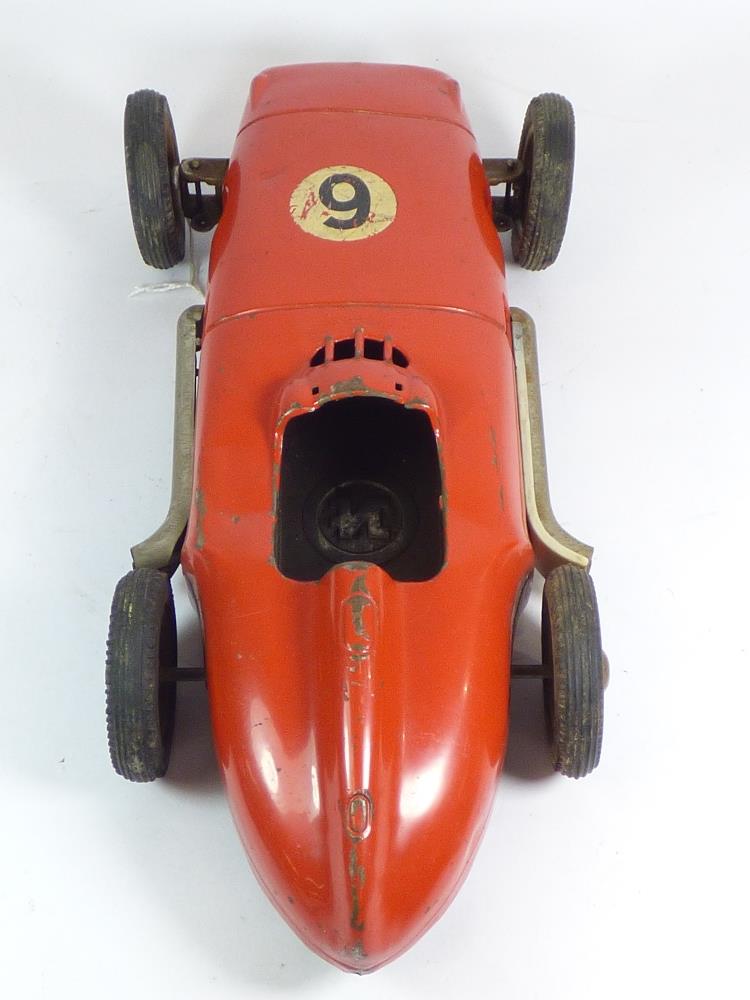 RED TINPLATE RACING CAR, MADE IN WEST GERMANY, MISSING SEAT & INTERIOR, WITH DRIVER STEERING - Image 7 of 12