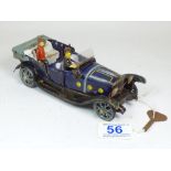 CLOCKWORK TIN PLATE TOY WITH DRIVER