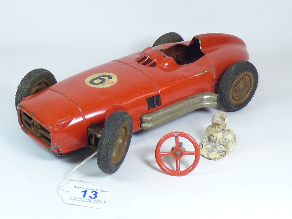 RED TINPLATE RACING CAR, MADE IN WEST GERMANY, MISSING SEAT & INTERIOR, WITH DRIVER STEERING