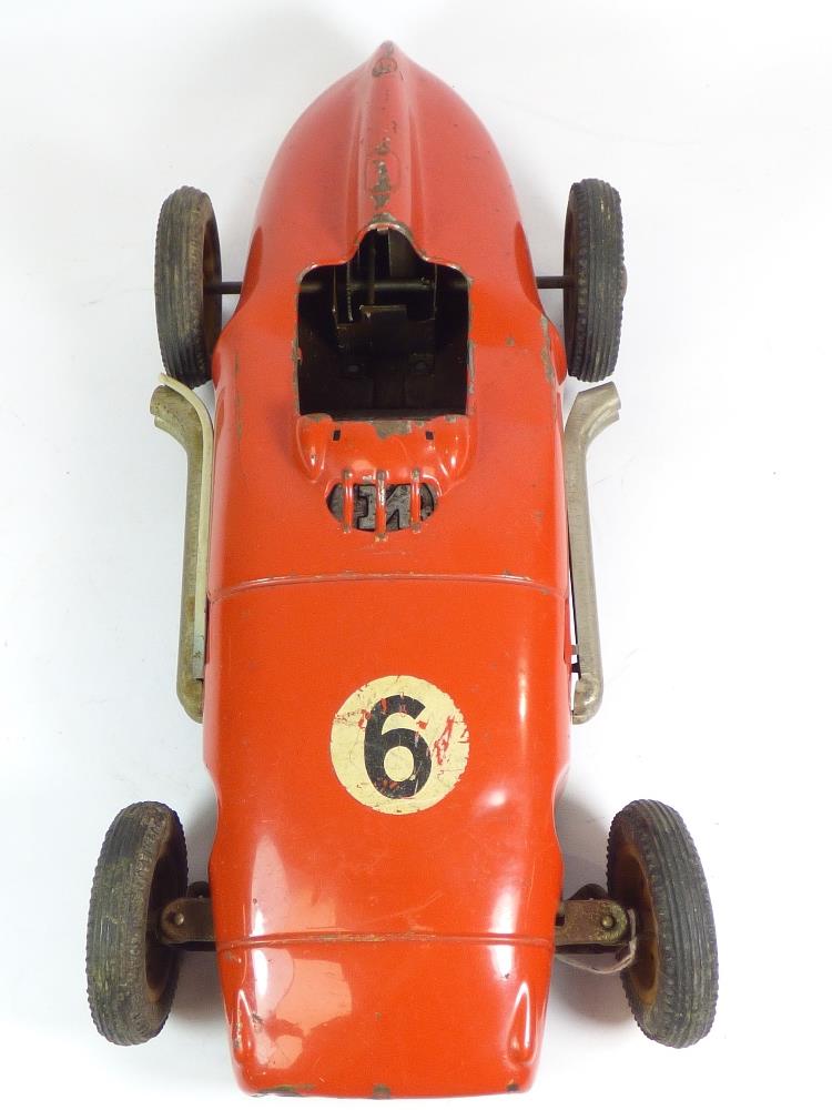 RED TINPLATE RACING CAR, MADE IN WEST GERMANY, MISSING SEAT & INTERIOR, WITH DRIVER STEERING - Image 5 of 12