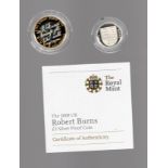 Silver proofs x 2. £1 2998 Royal shield and £2 2009 Robert Burns. Boxed with certs