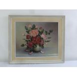 Reekie framed oil on canvas still life of roses, signed bottom left, 44 x 54cm