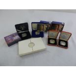 A quantity of silver coins to include £5 QEII Golden Jubilee, The Queen Mother centenary year crown,