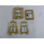 Four gilded metal pierced rectangular photograph frames