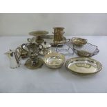 A quantity of silver plate to include a tray, a wine cooler, dishes and sauce boats (12)