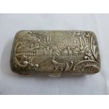 A late Victorian silver rounded rectangular spectacle case, the hinged cover embossed with an