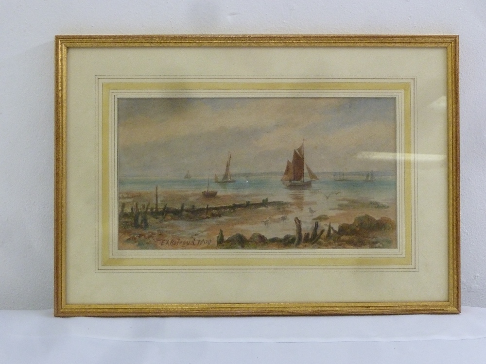 E. A. Holroyd framed and glazed watercolour of sailing boats by the seashore, signed bottom left, 17