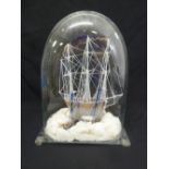 A Victorian Nailsea glass three mast Galleon under an original glass dome