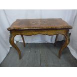A Victorian rectangular walnut card table, inlaid hinged top on four cabriole legs
